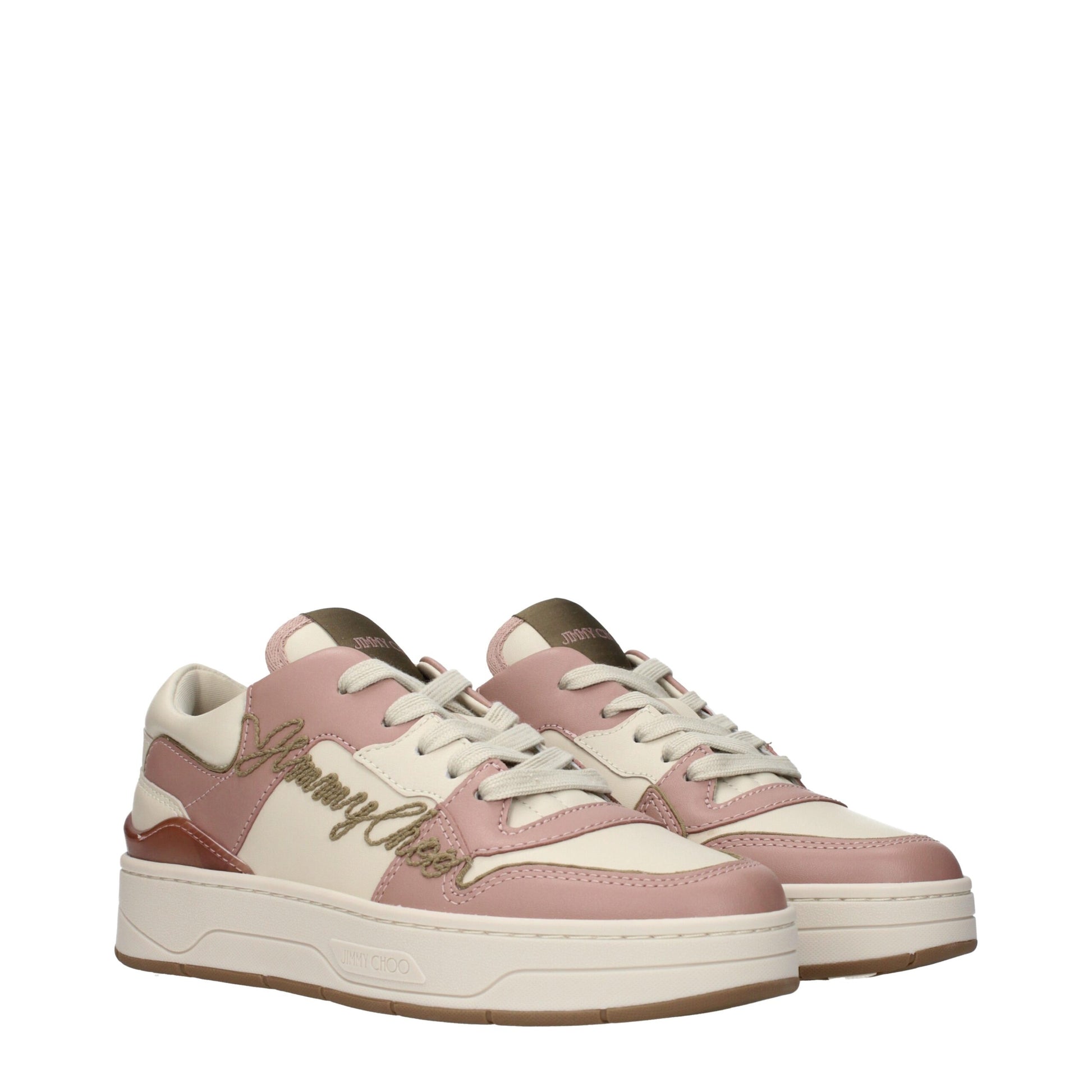 Pink leather sneakers with gold lettering, laces, and sole