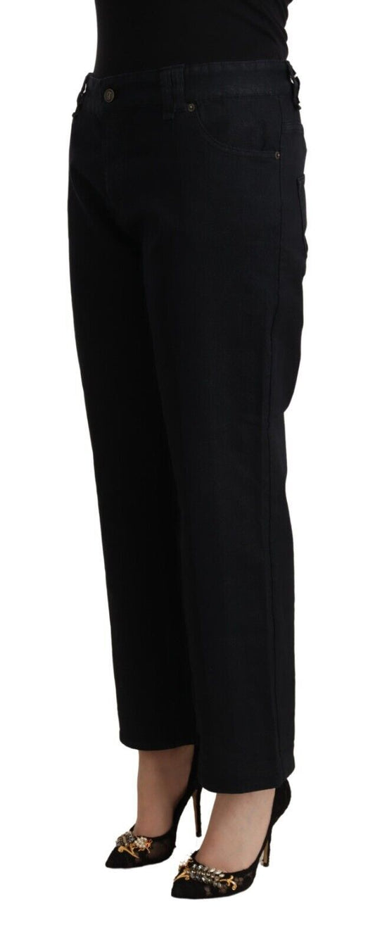 Woman wearing black pants and heels