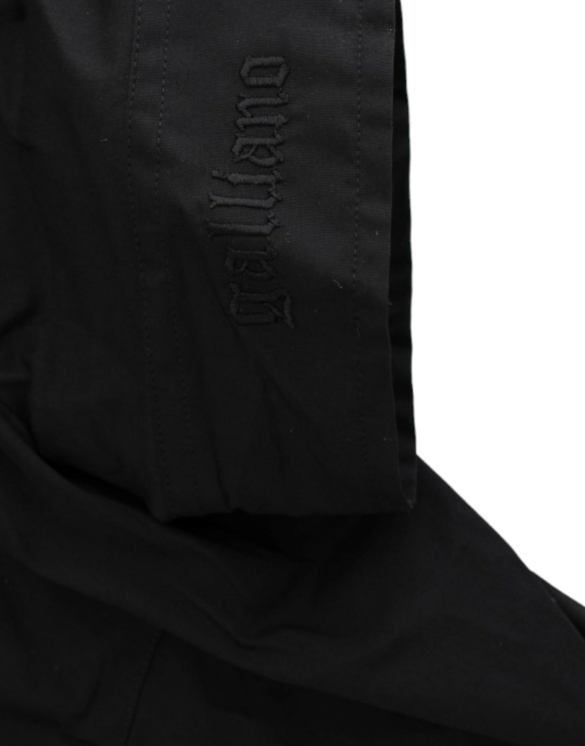 Black pants with white logo on side