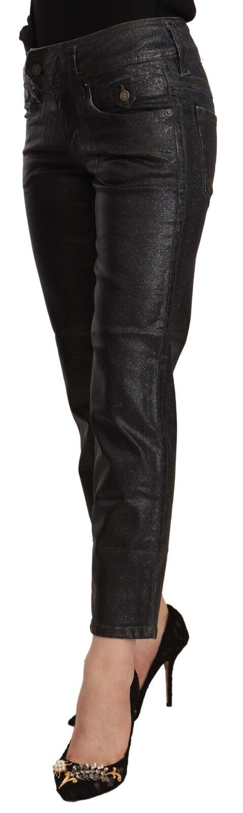 Black pants with ruffled detailing on legs