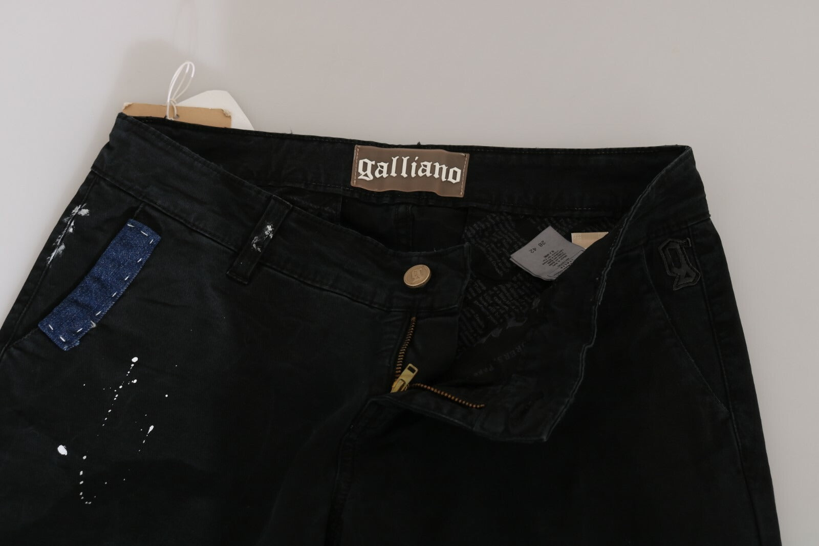 Pair of black jeans on hanger
