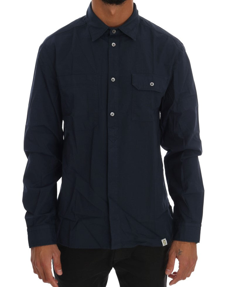 Man wearing dark blue jacket with buttons down front