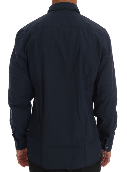 Navy blue long sleeve shirt on a mannequin