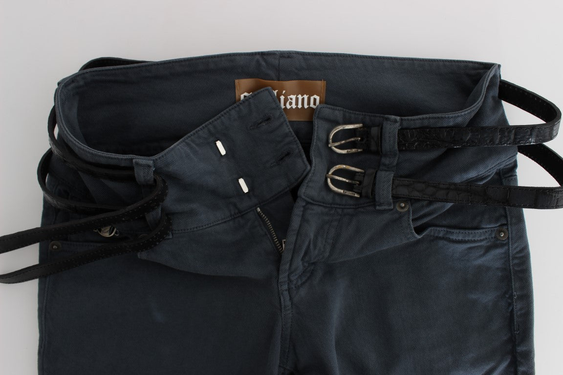 Blue denim jeans on a white surface