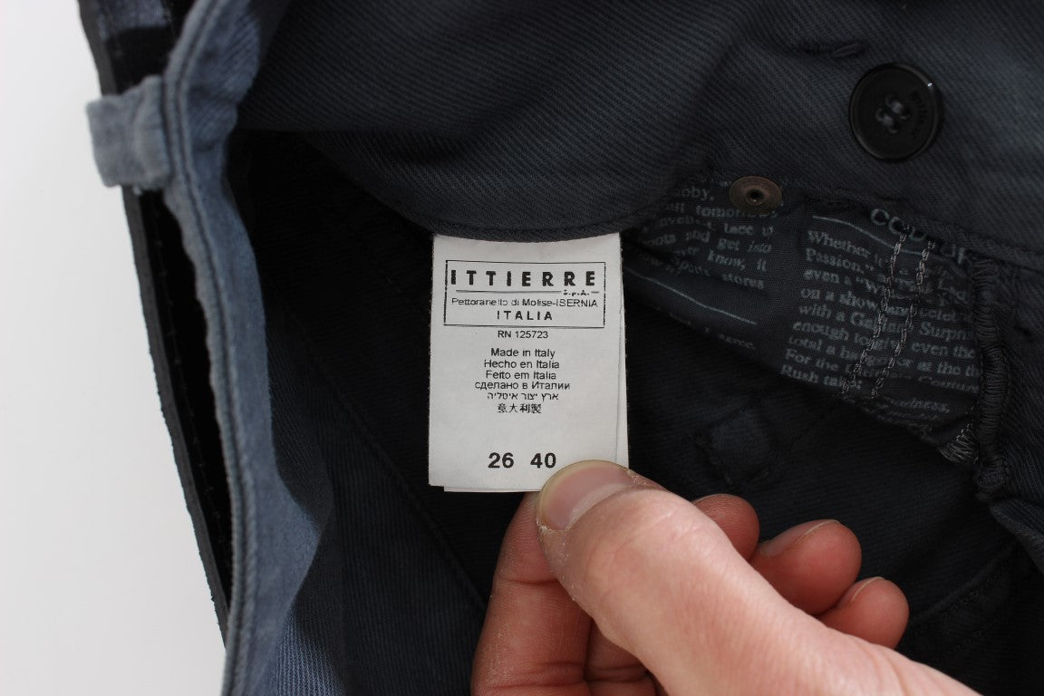 Hand holding tag on inside of jacket