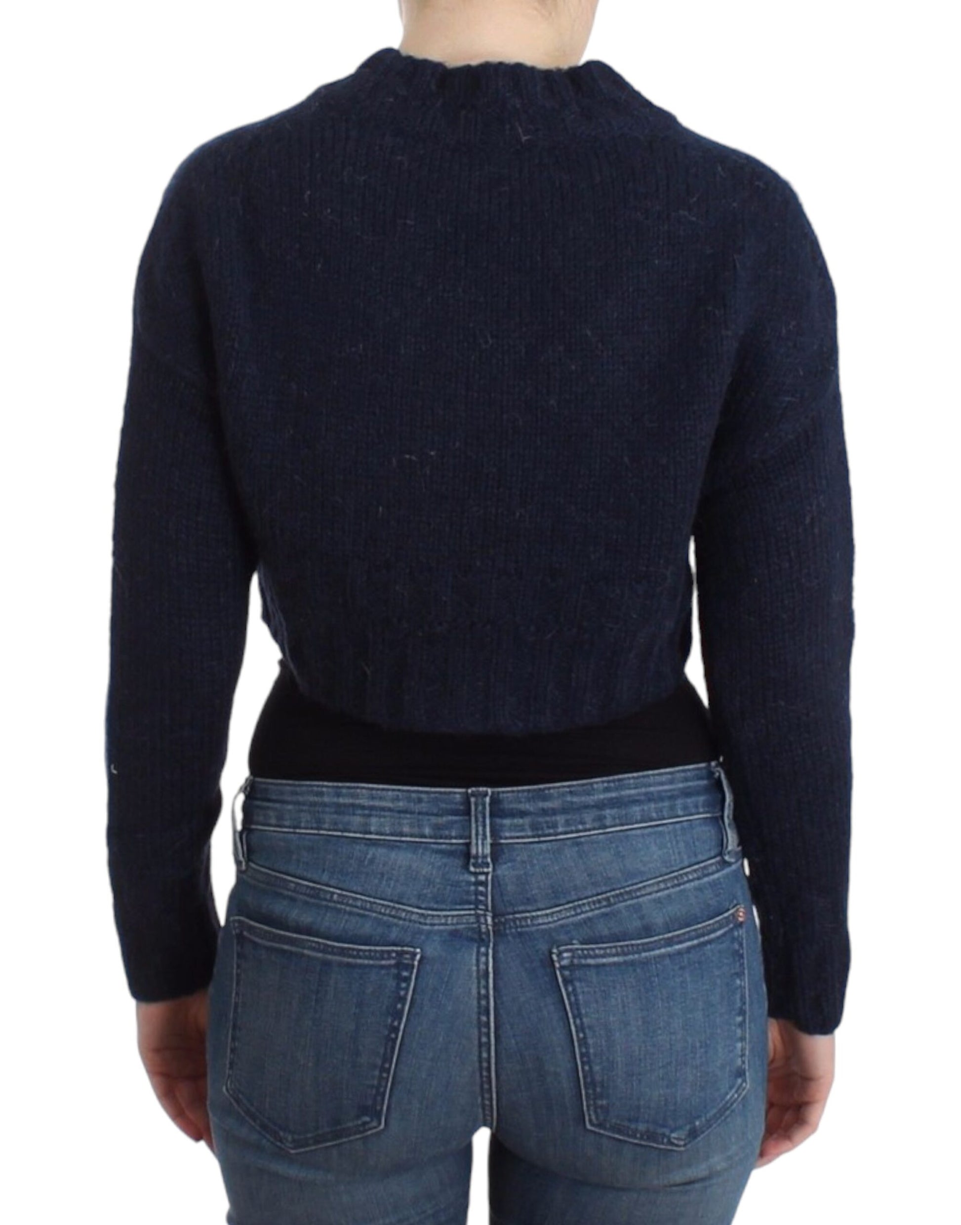 Woman wearing blue sweater and jeans