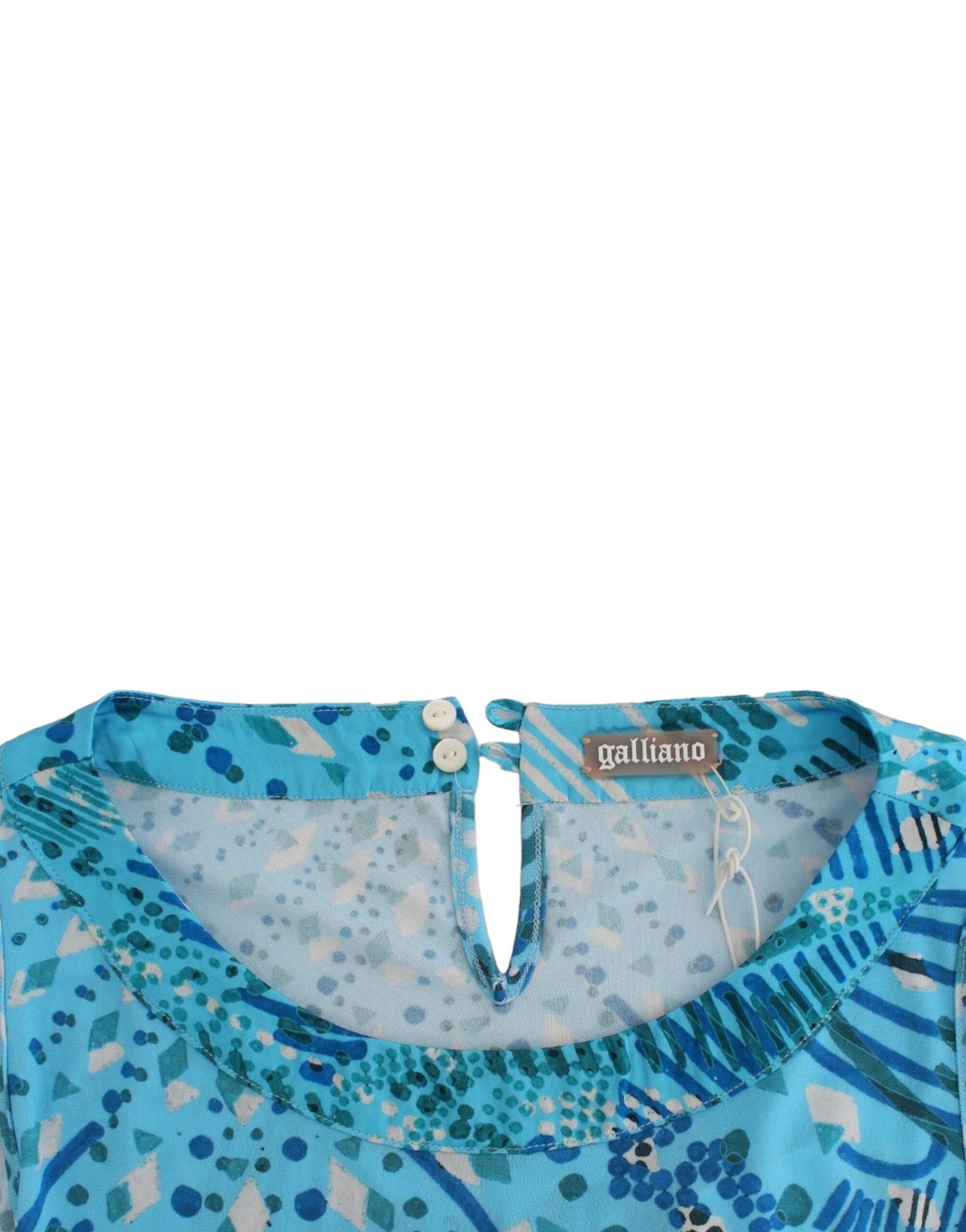 Blue patterned blouse on hanger