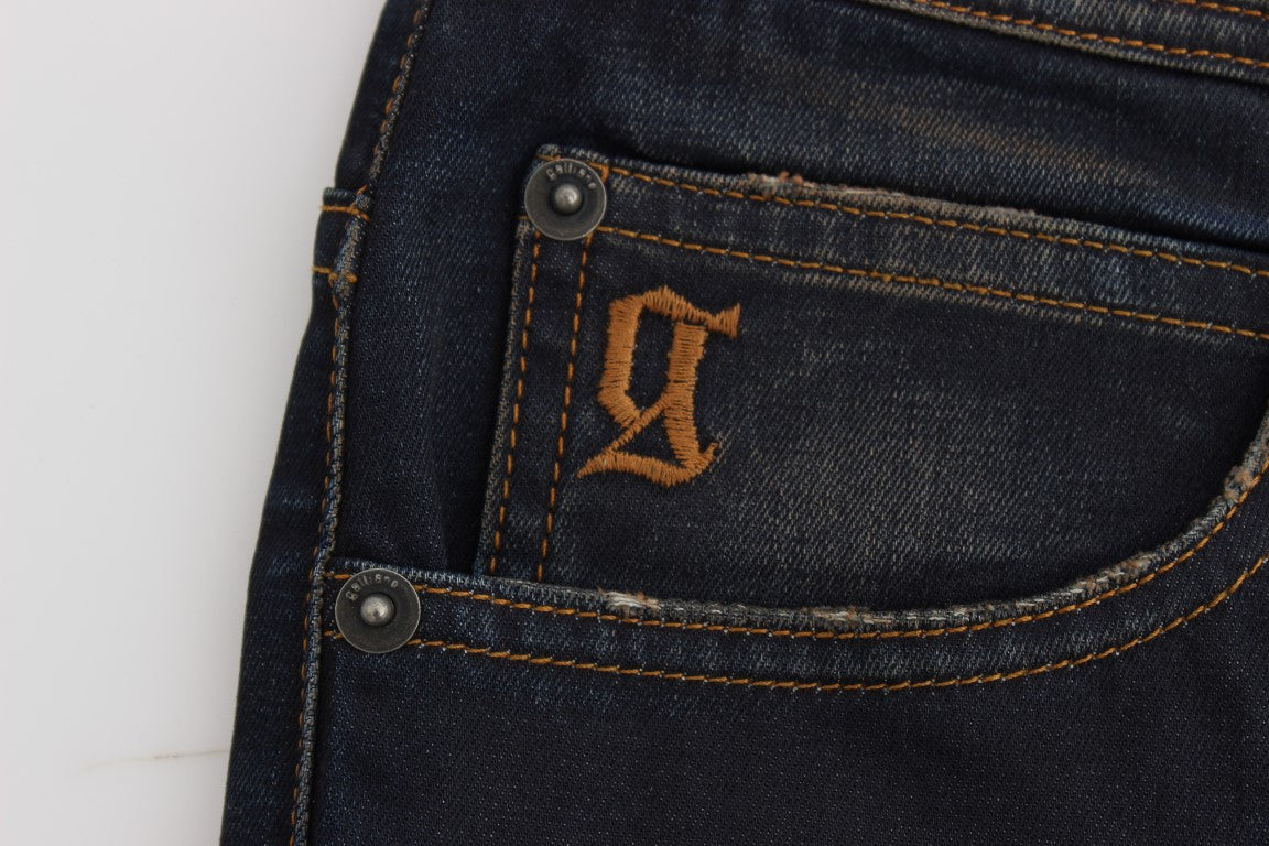 Blue denim jeans with a brown logo on the back pocket