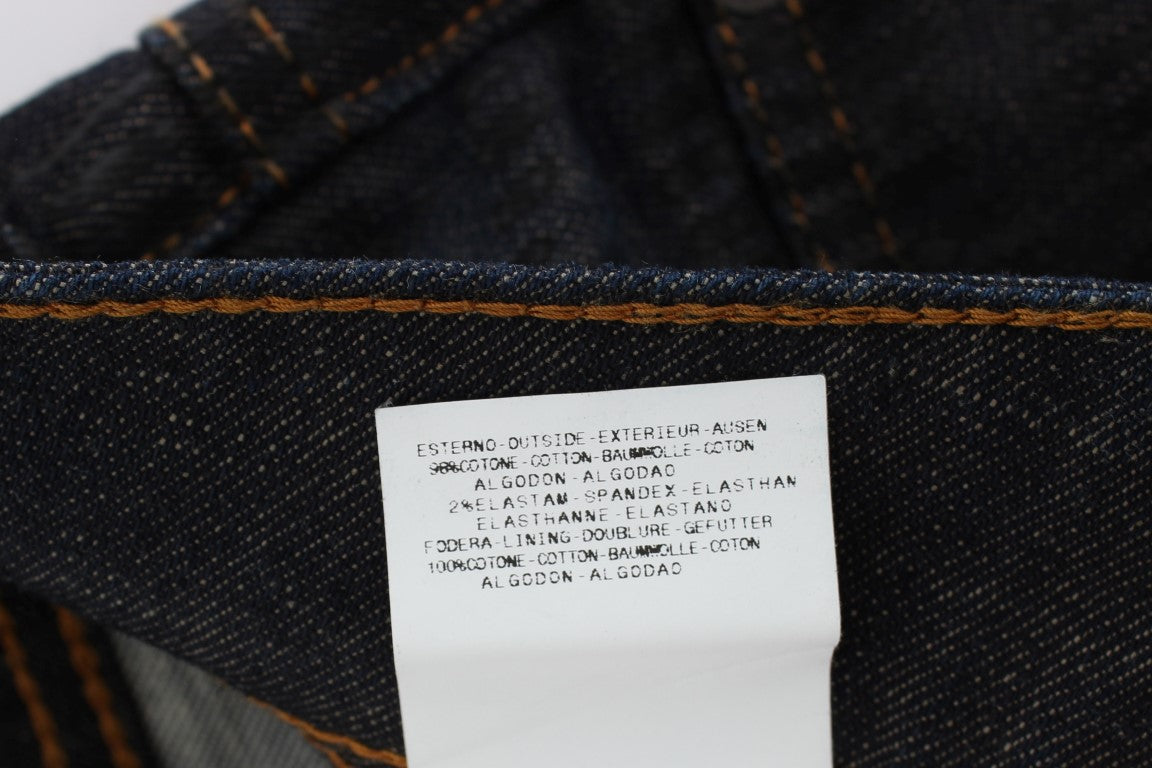 Denim jeans on hanger with tag inside waistband