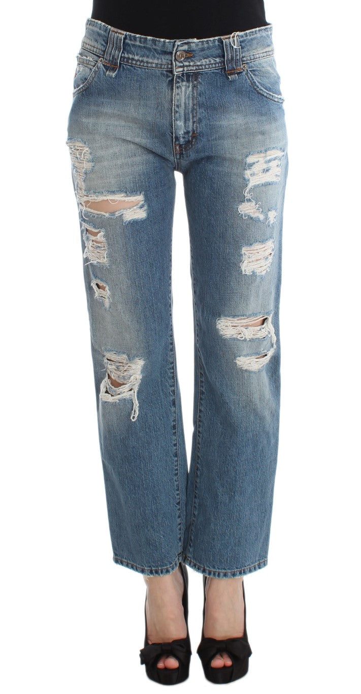 Pair of distressed blue jeans on a mannequin