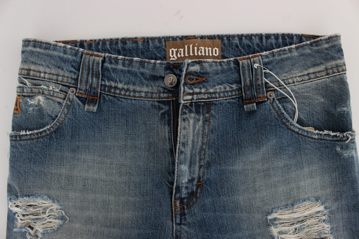 Pair of blue denim jeans with distressed details