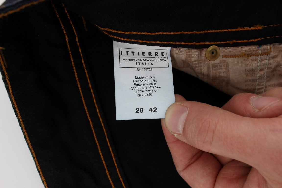 Hand holding a tag on jeans