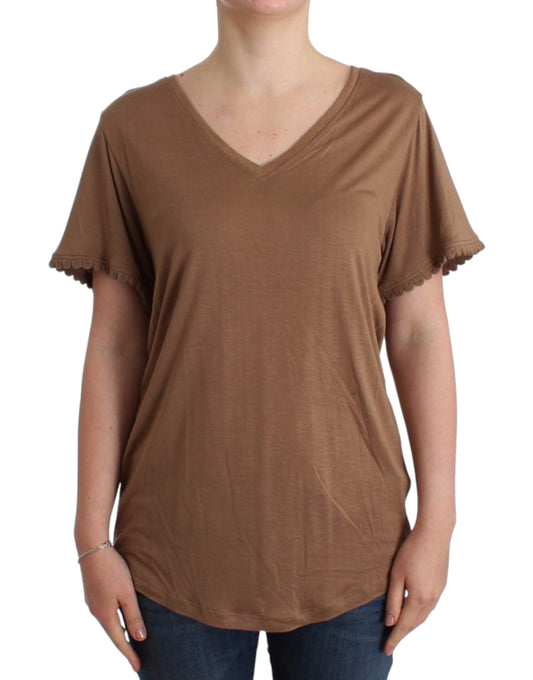 Brown short sleeved shirt on woman