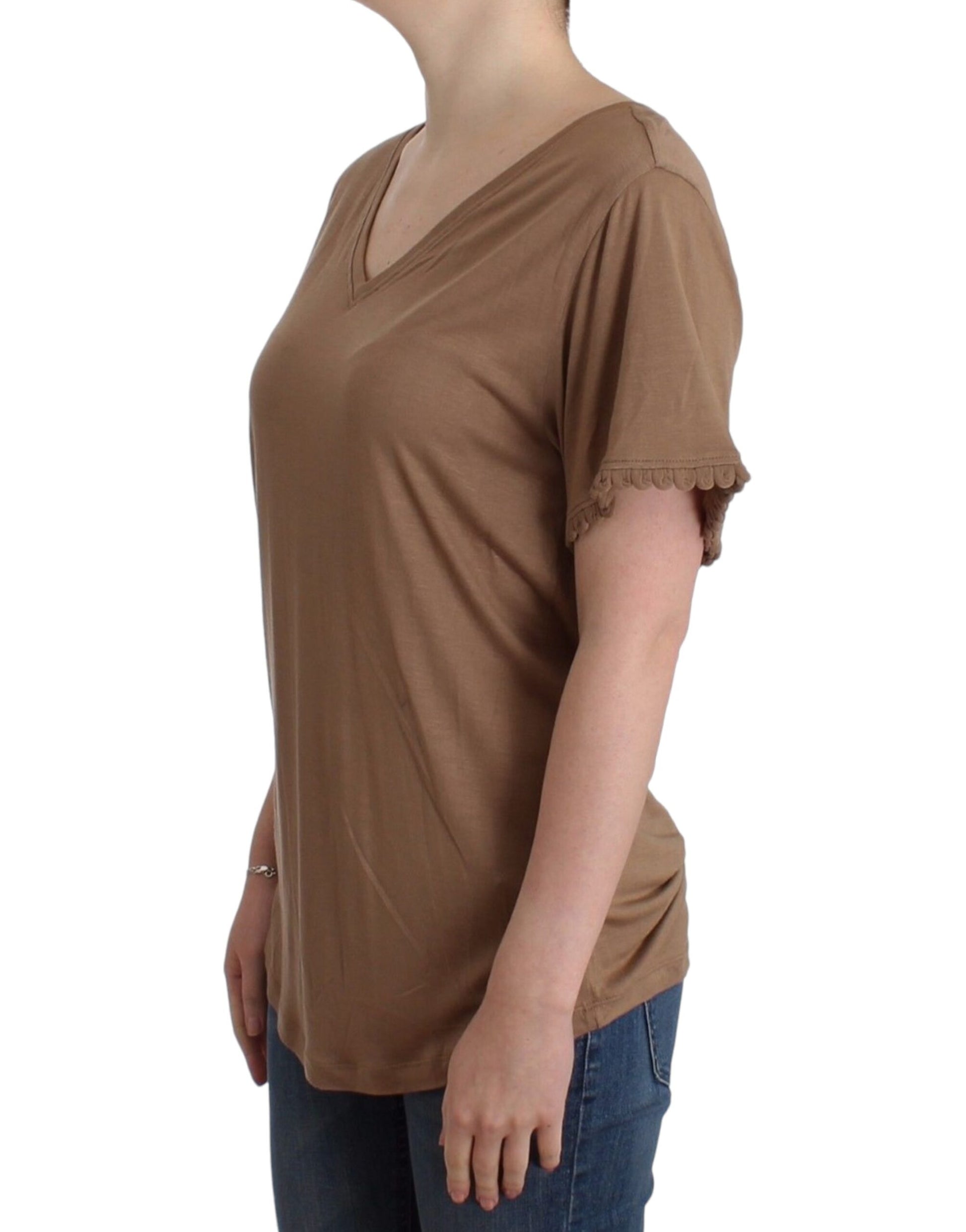 Woman wearing brown shirt