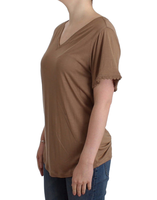 Woman wearing brown shirt