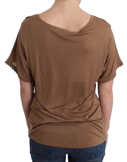 Brown shirt on back of woman