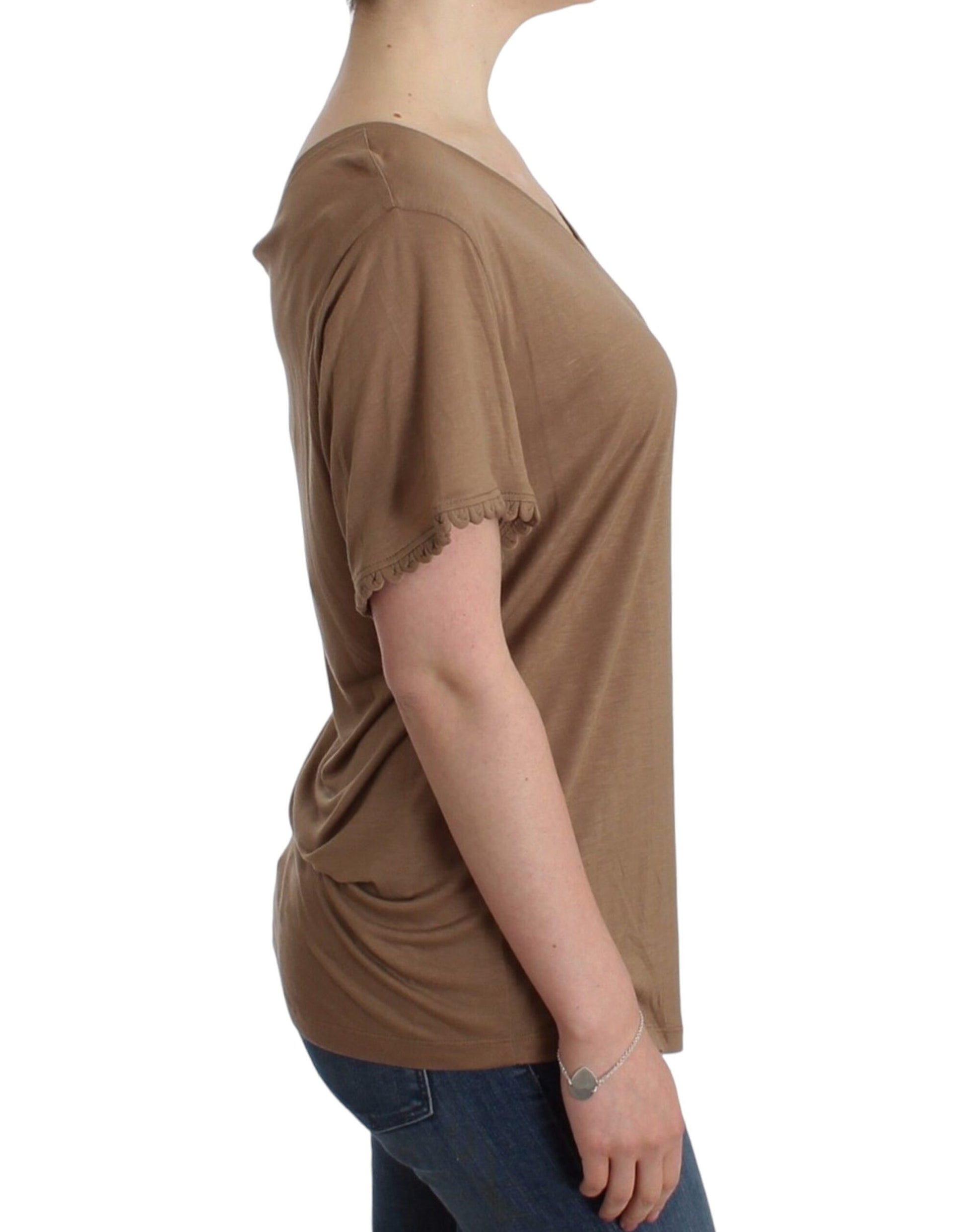 Woman wearing brown top
