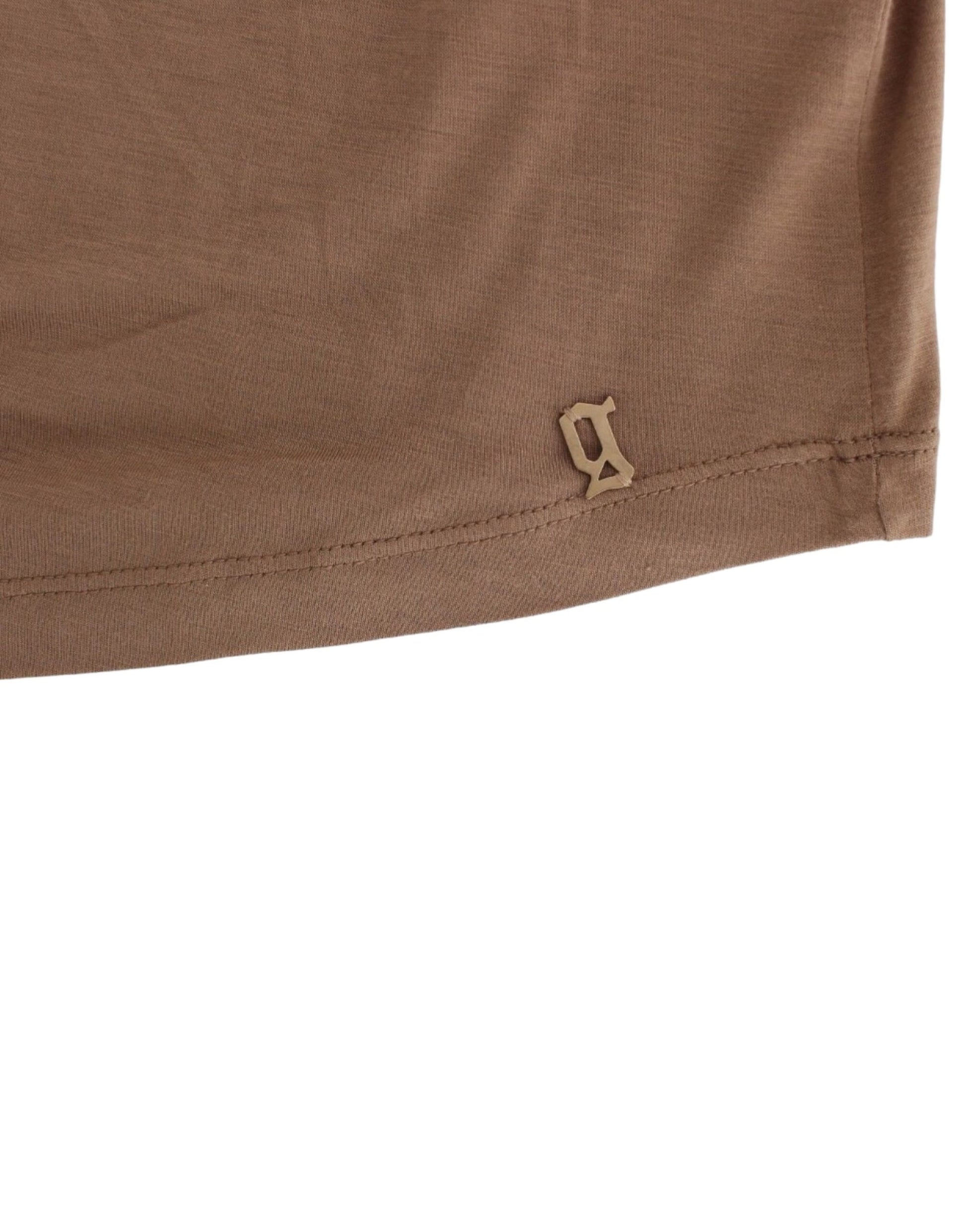 Brown shirt with a small logo on the sleeve