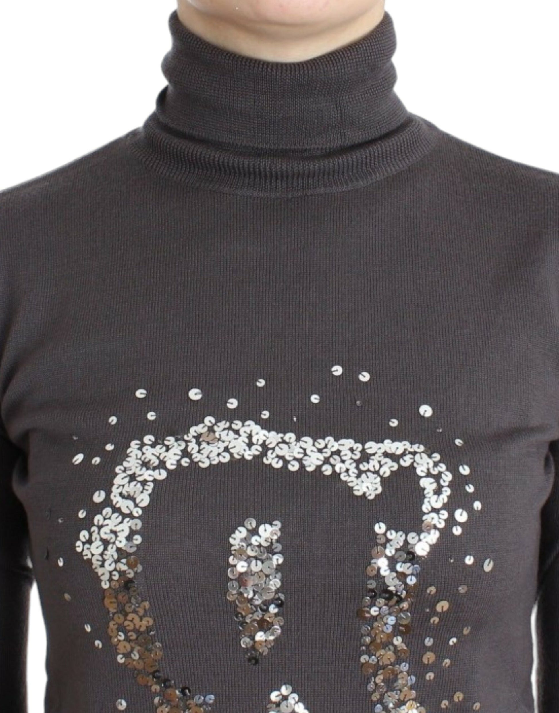 Black turtleneck sweater with sparkly lettering on chest