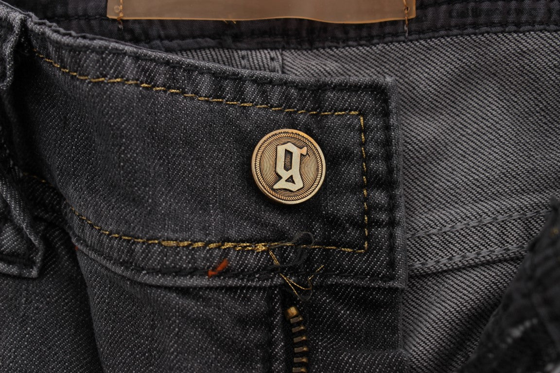 Blue denim jeans with a button on the front pocket