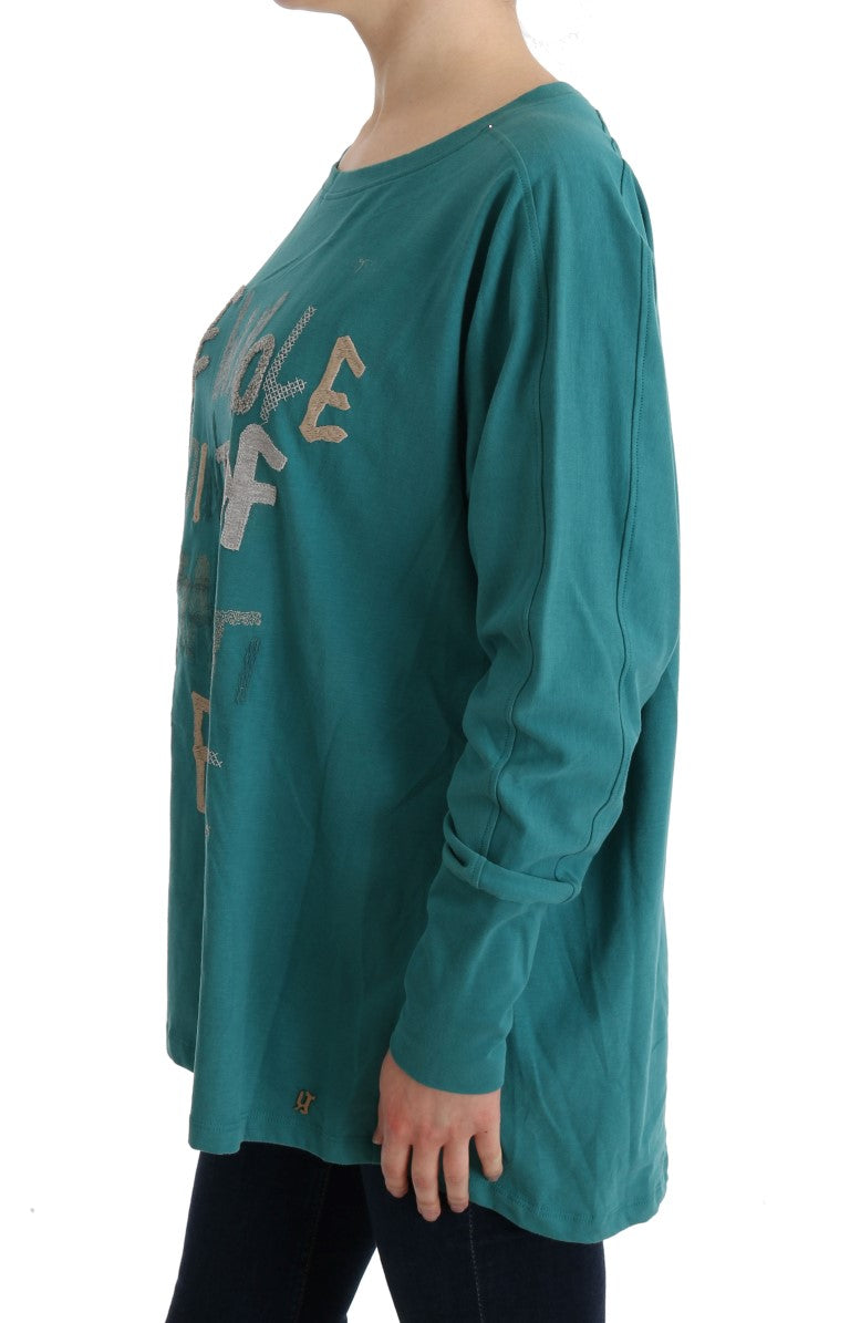 Long sleeve teal shirt with embroidered design on front