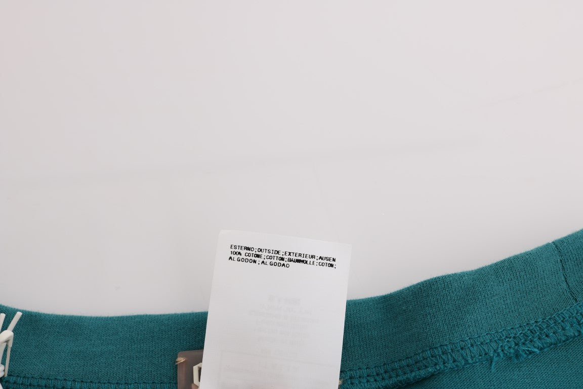 Green fabric with tag attached to it