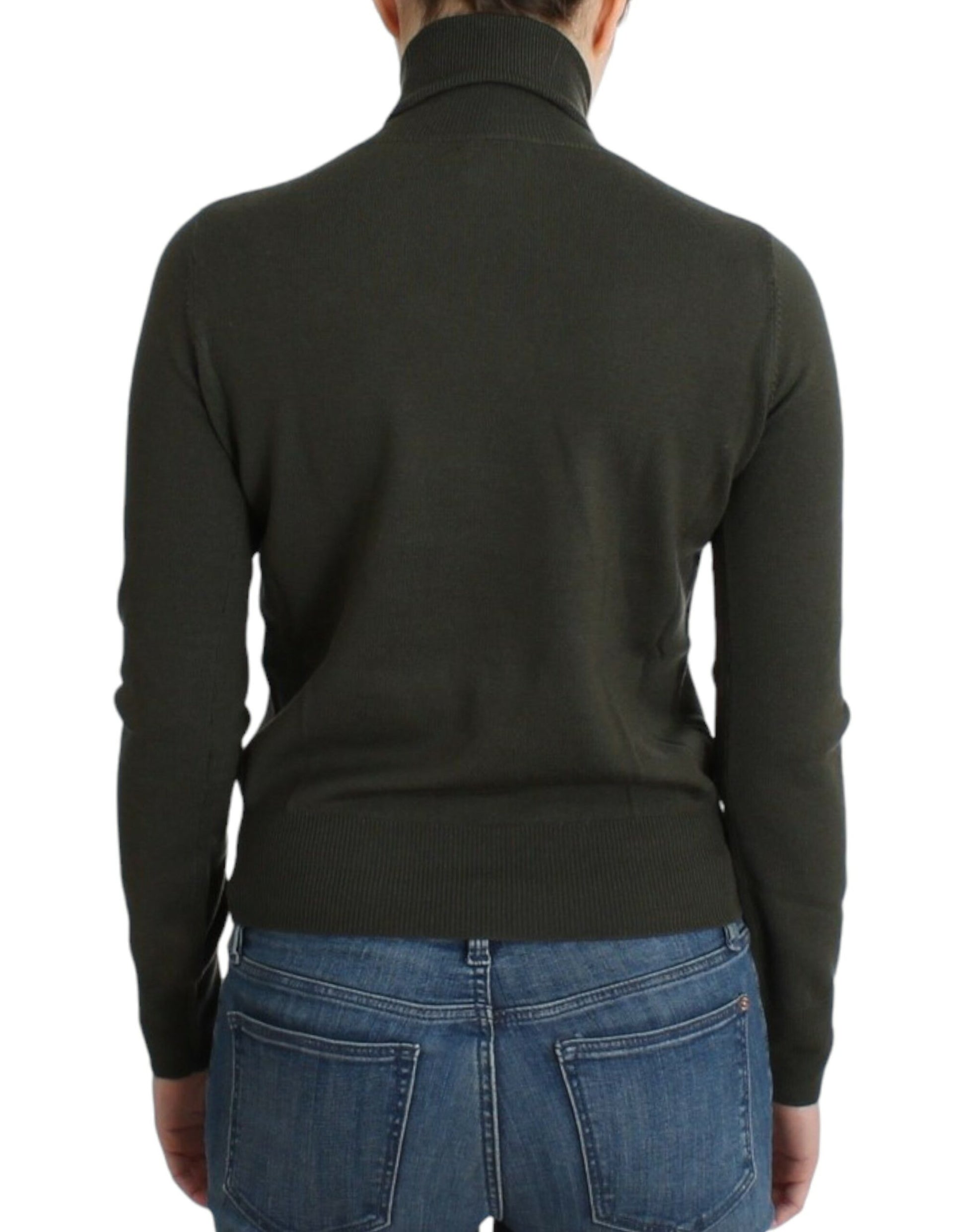 Woman wearing dark green sweater