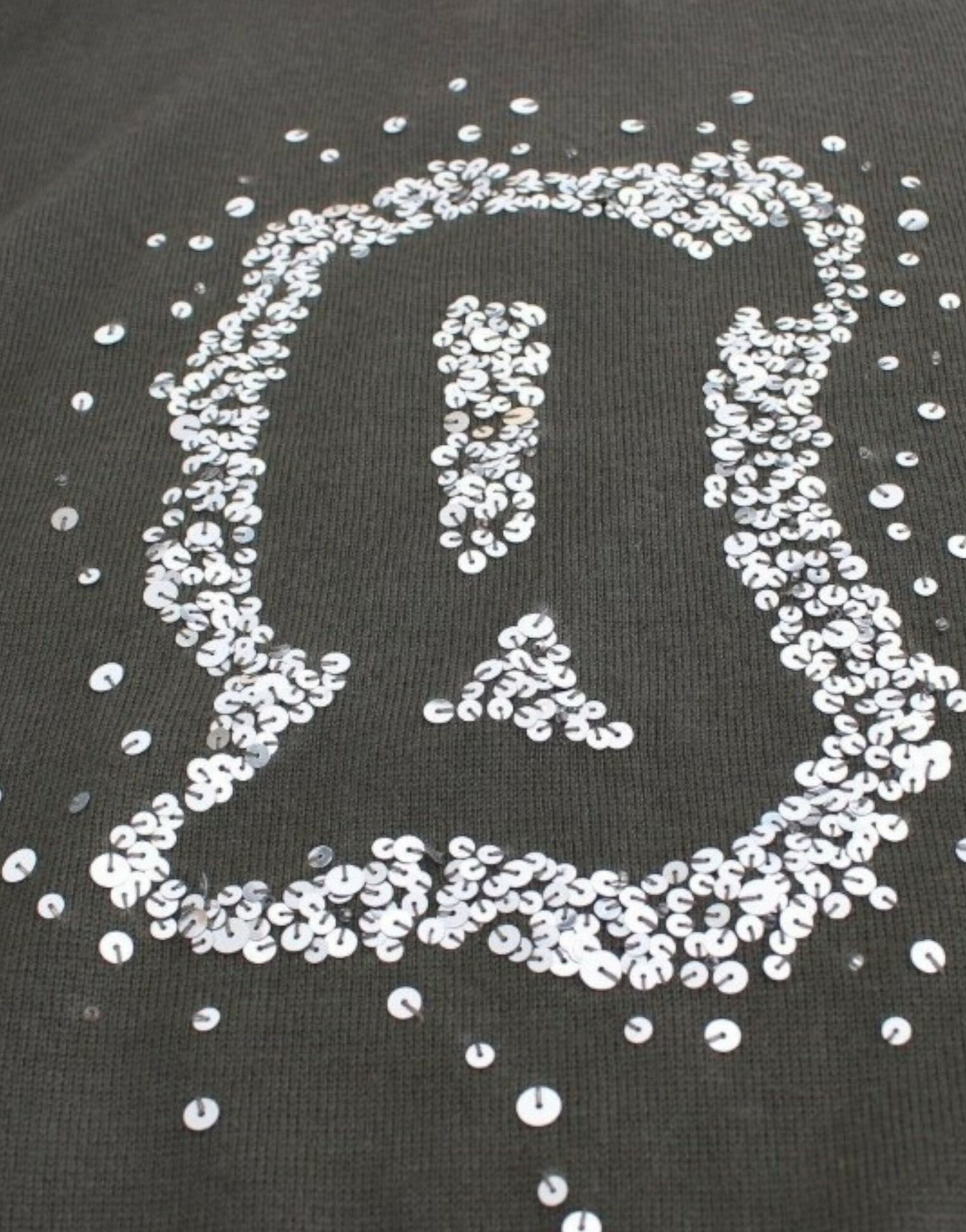 Mickey mouse logo made from coins