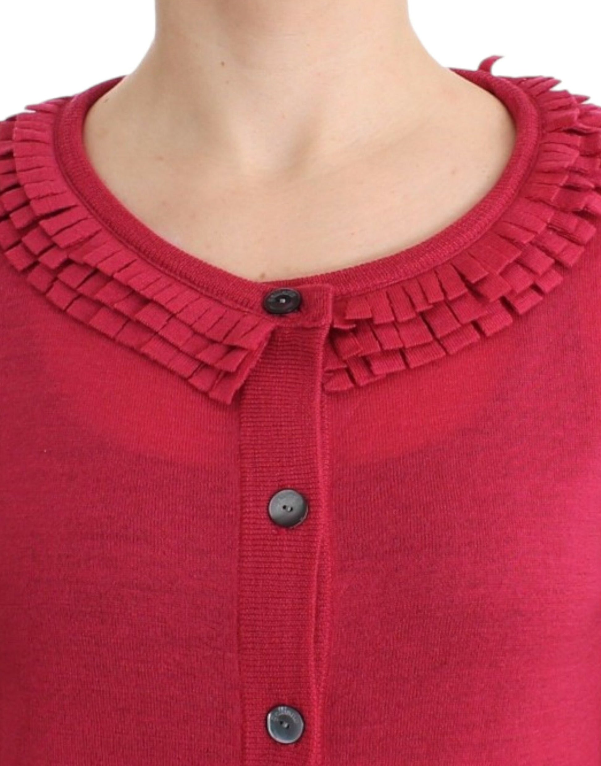 Red knitted sweater with fringe trim on neckline