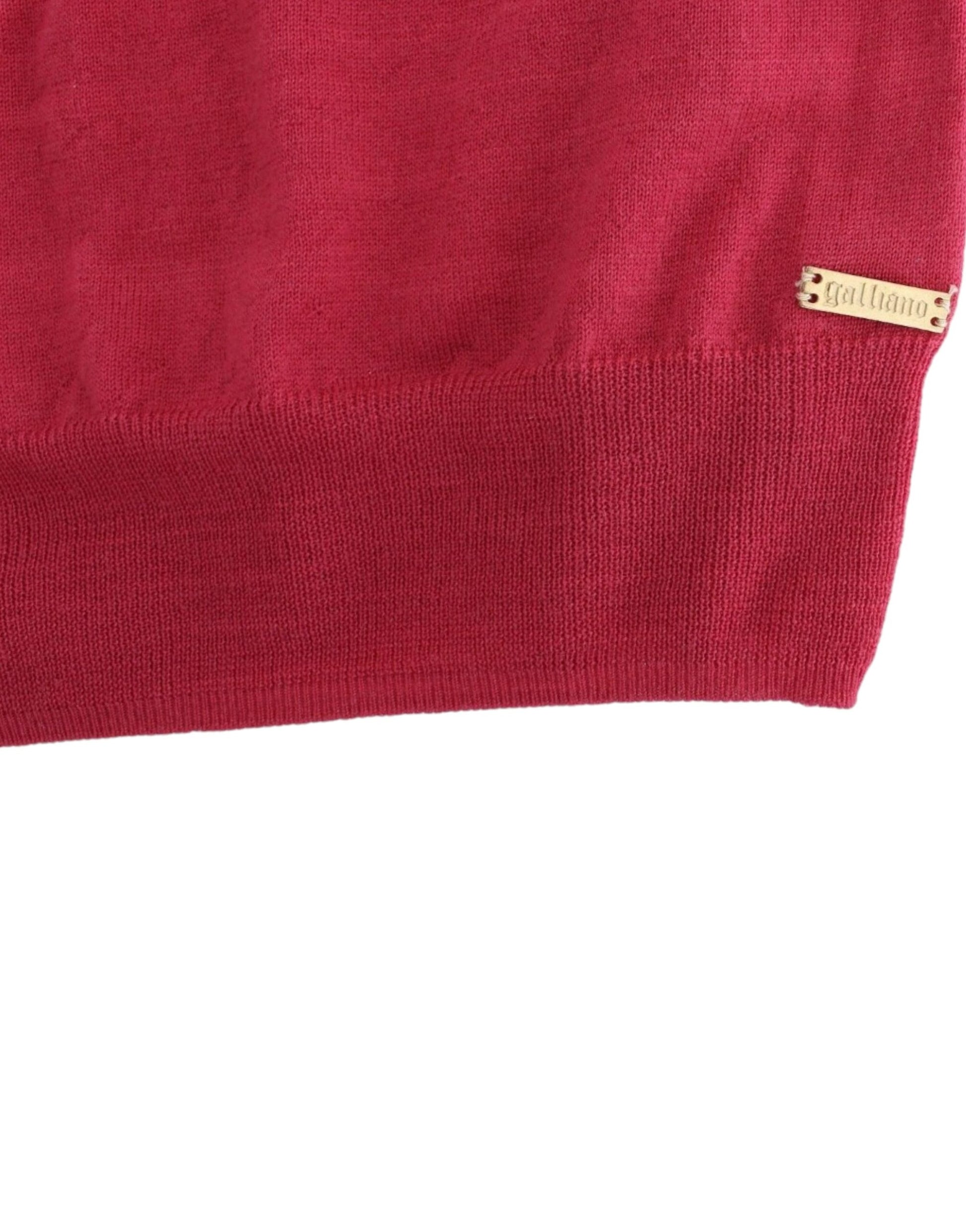 Red knitted sweater with gold zipper