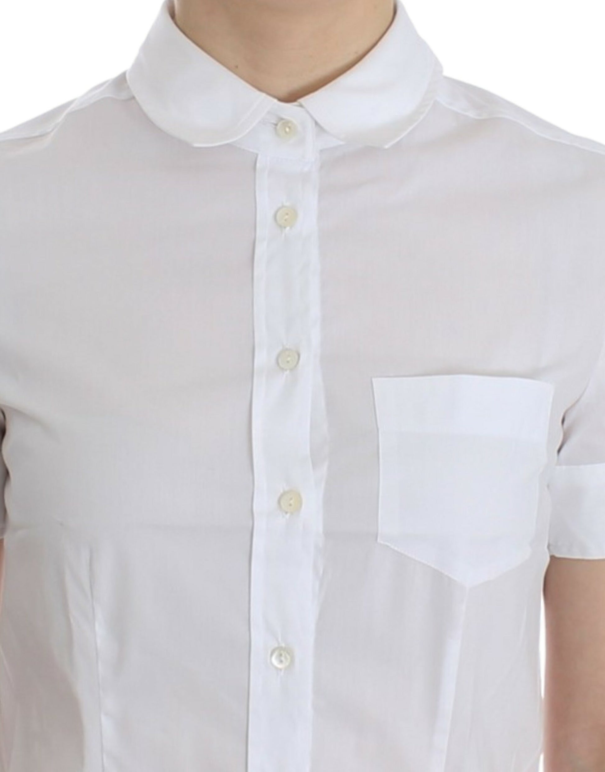 White collared shirt with buttoned front and pocket on left side