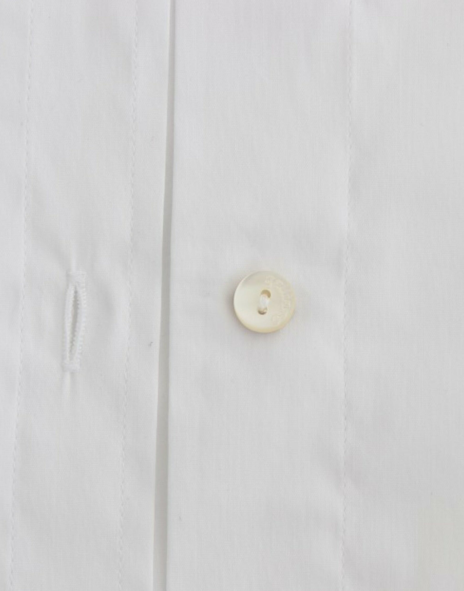 White shirt with button on front