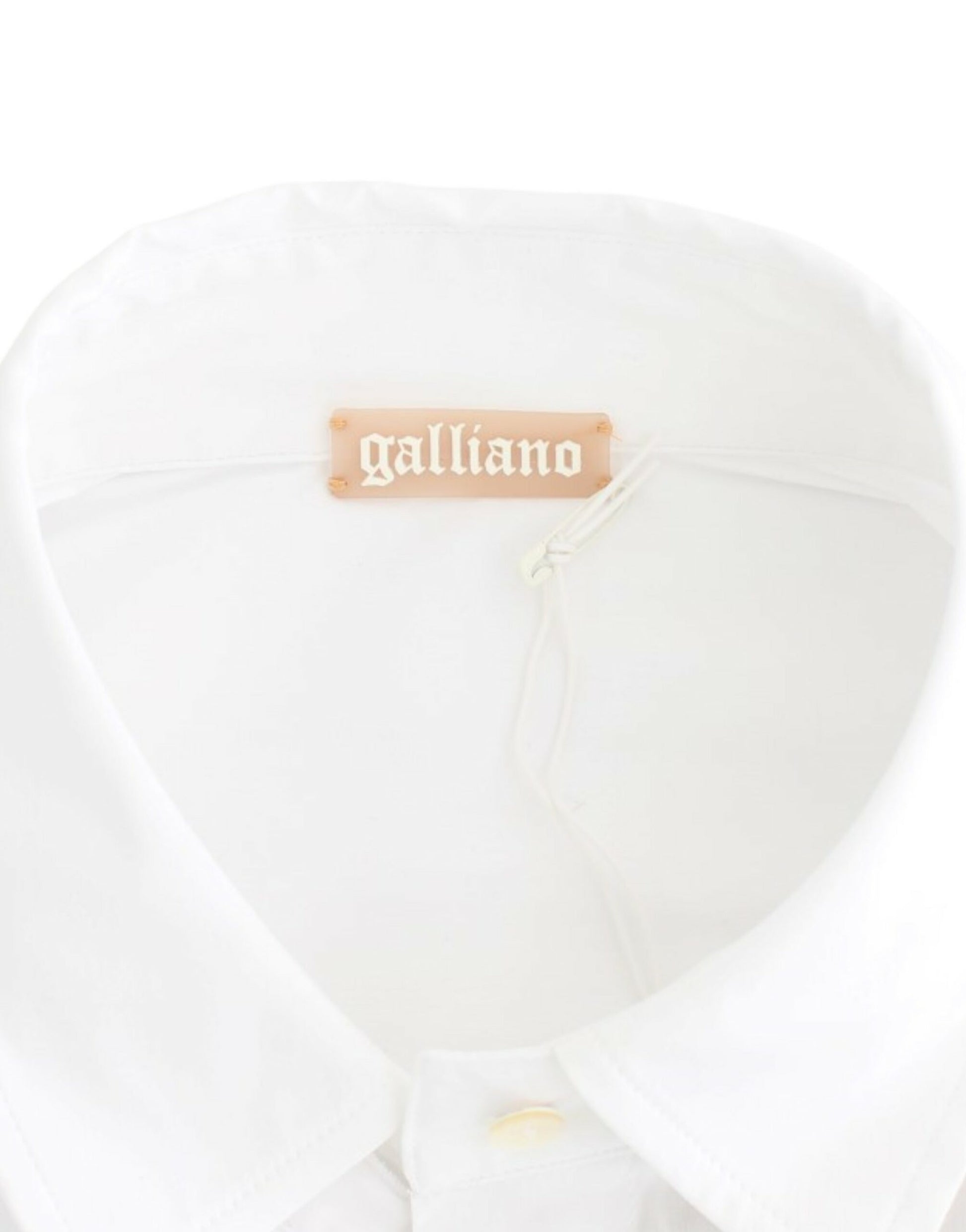 White collared shirt with a label on the inside