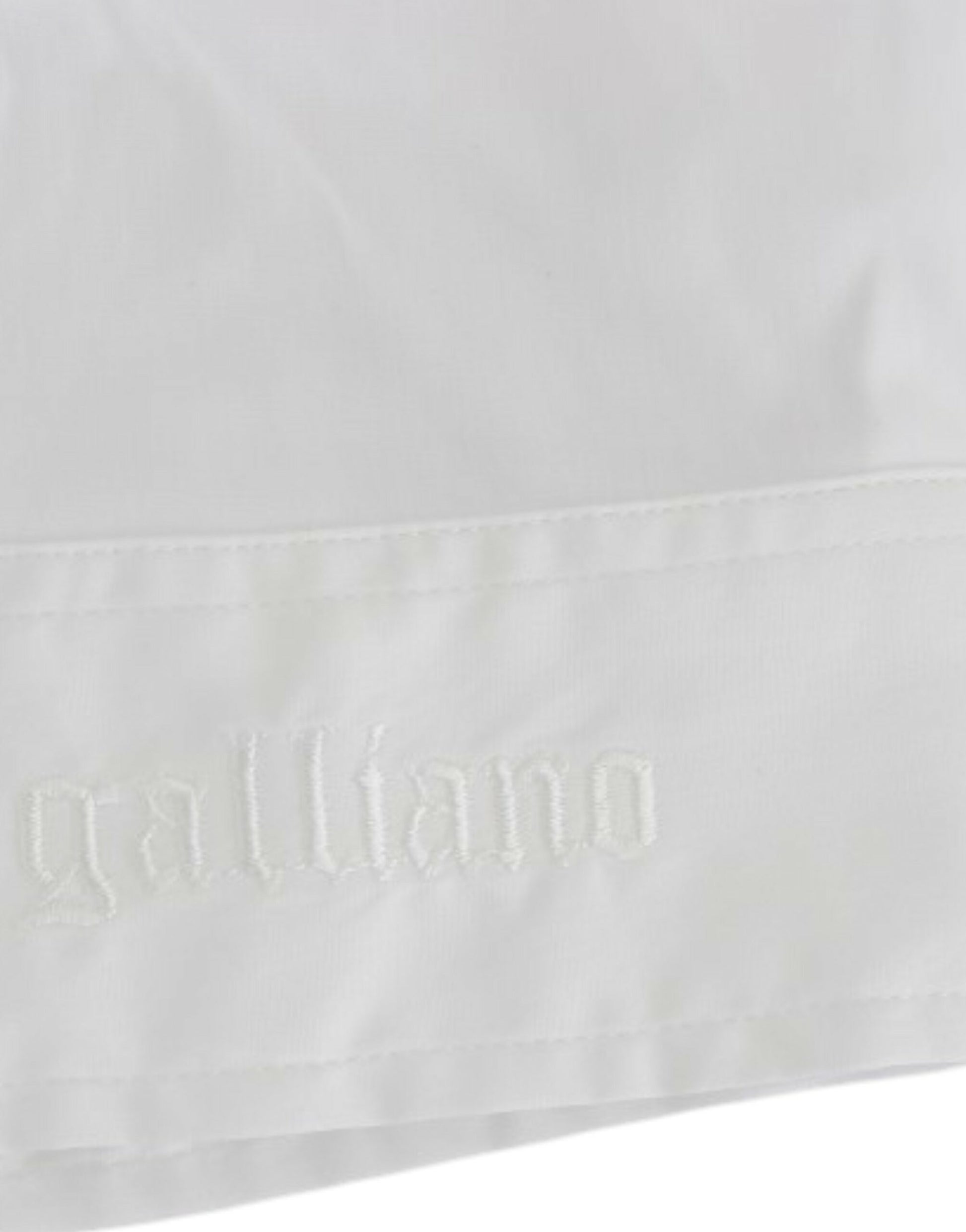 White cloth with embroidered logo