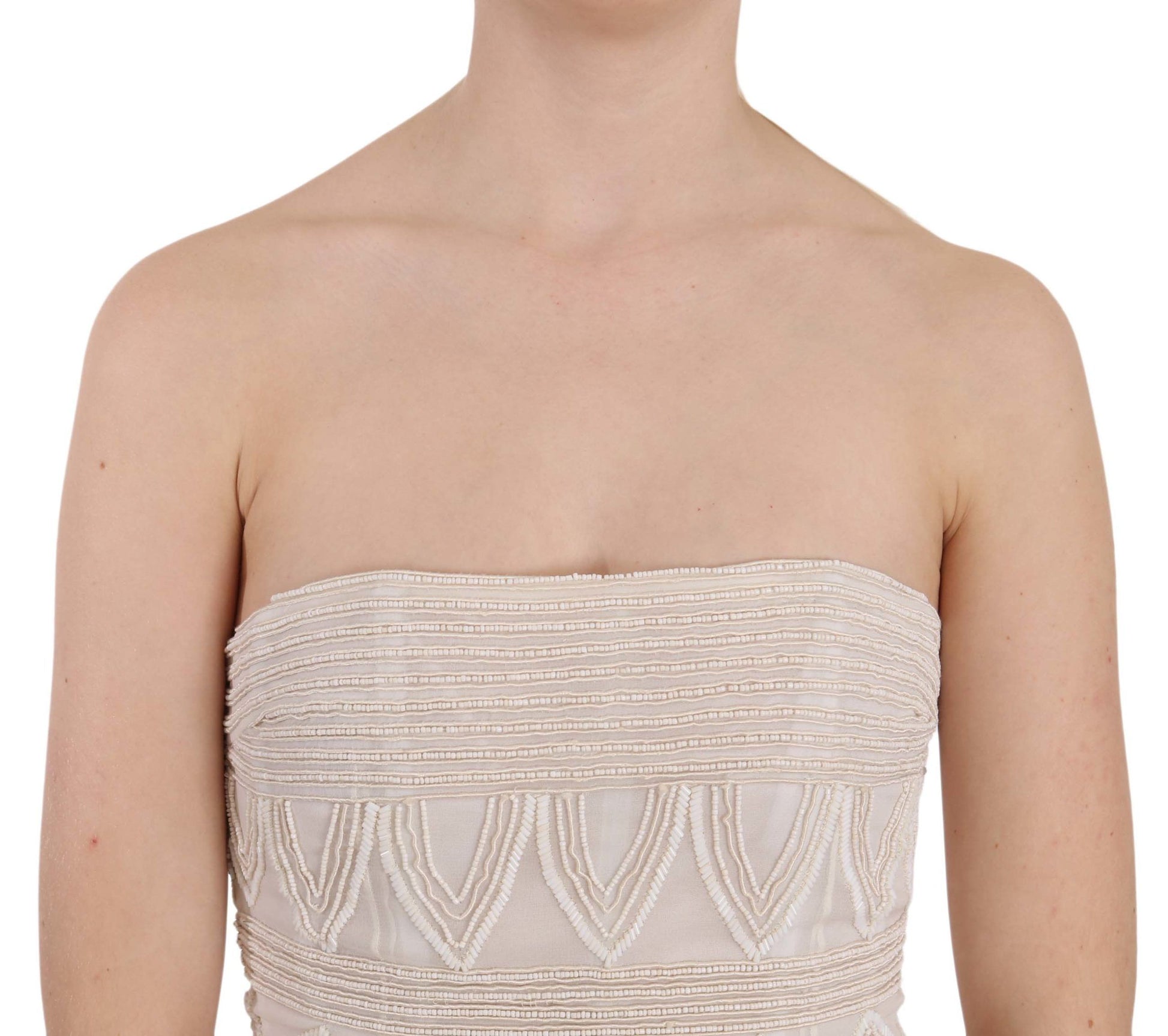 Sleeveless beaded dress on a mannequin