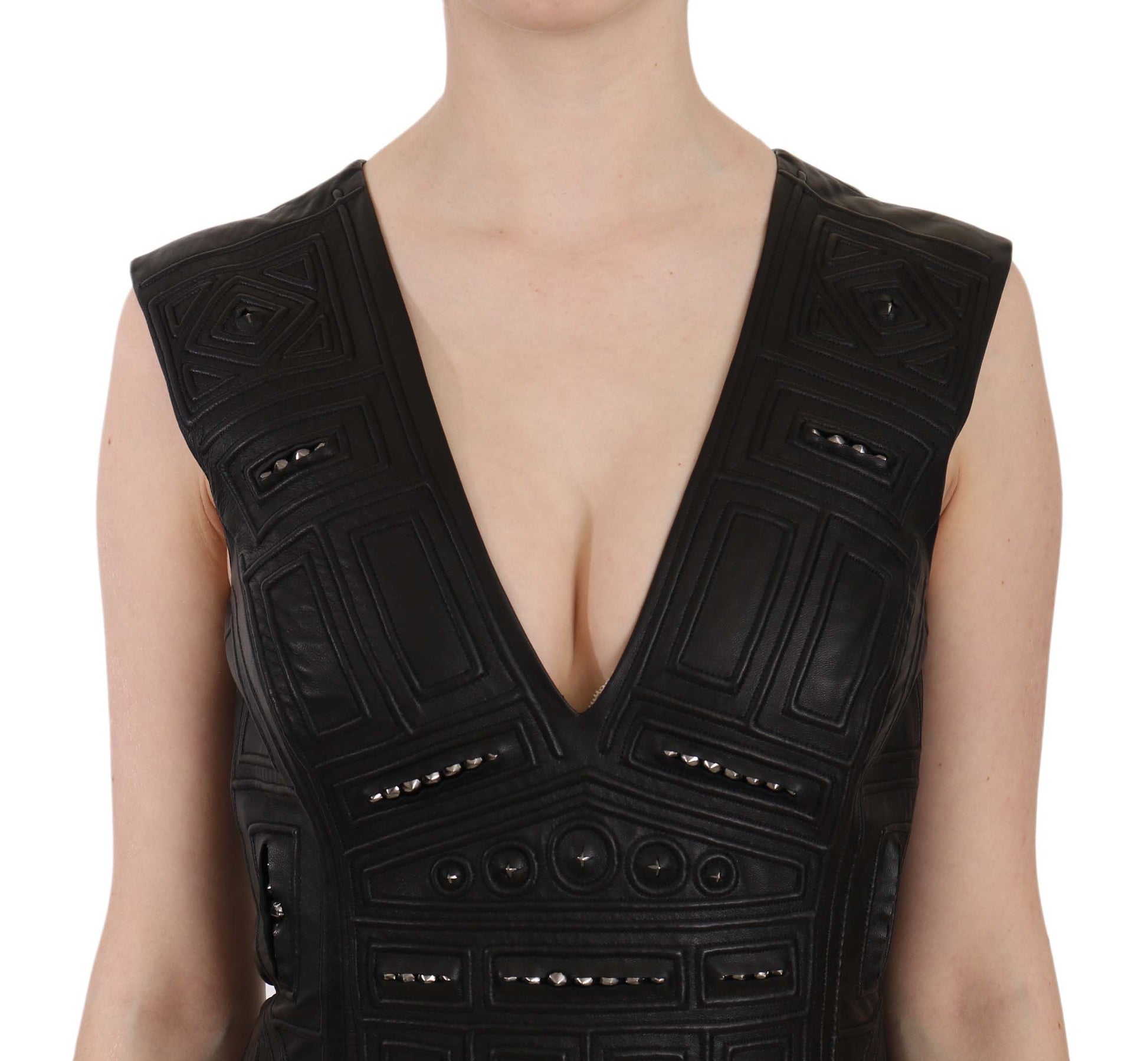 A black leather studded mini shift dress with a deep V-neckline and spaghetti straps