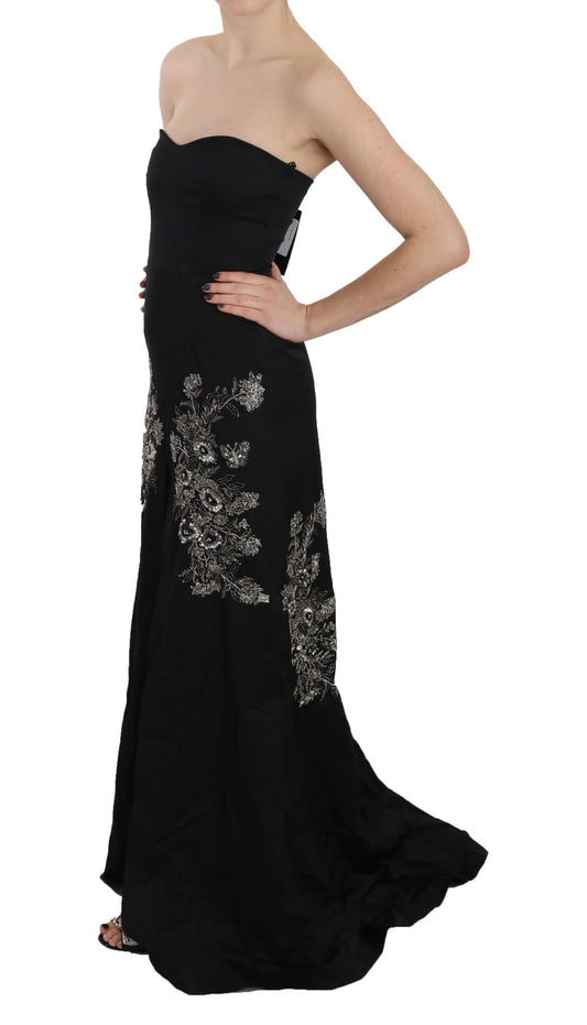A black sequined flare ball gown dress with a V-neckline and embellishments on the bodice