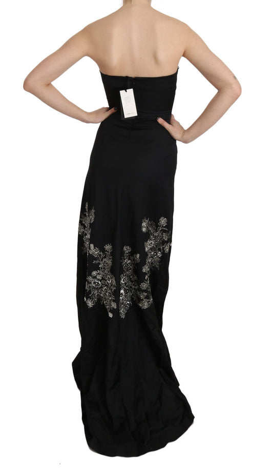 A black sequined flare ball gown dress with a backless design and embellishments on the bodice