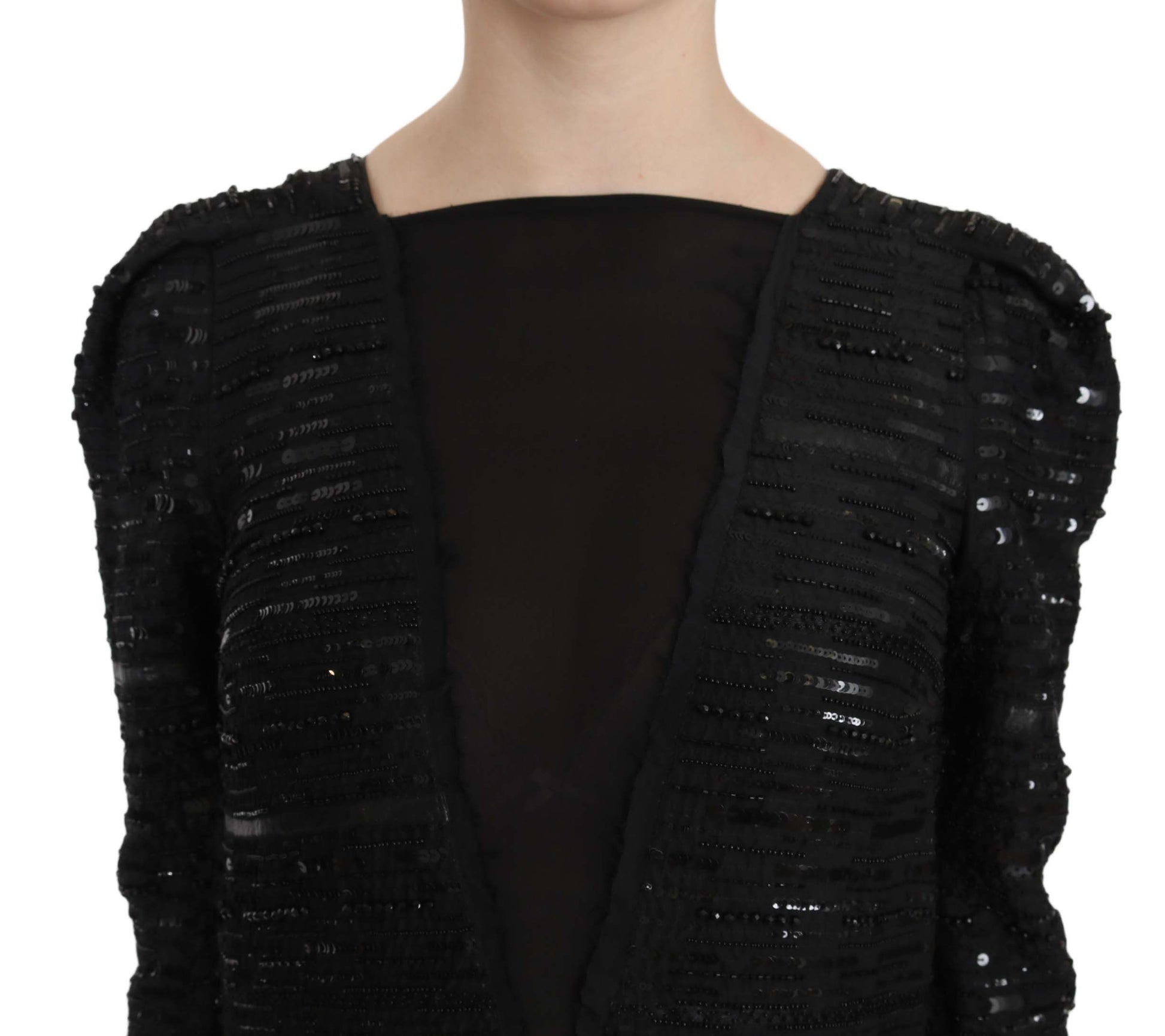 A black sequined gown dress with a V-neckline and long sleeves