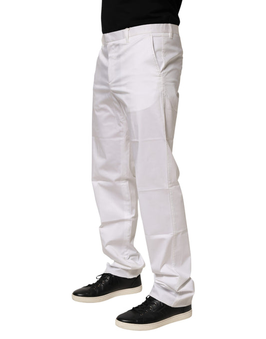 A pair of white cotton stretch dress pants for men, featuring a slim fit and elastic waistband