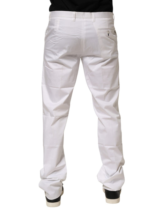 A pair of white cotton stretch dress pants for men, featuring a slim fit and elastic waistband