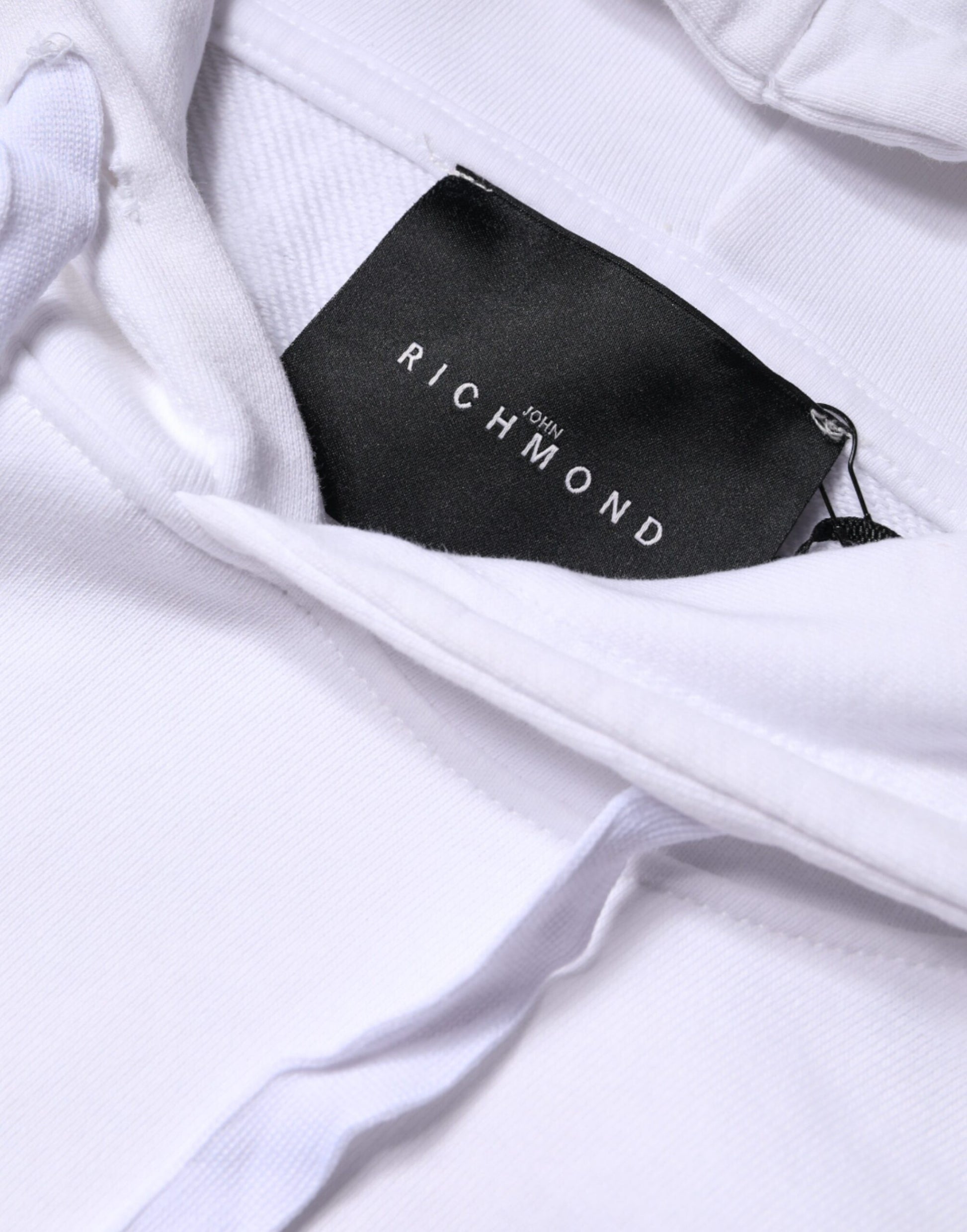 White hoodie with black label reading "RICHMOND"