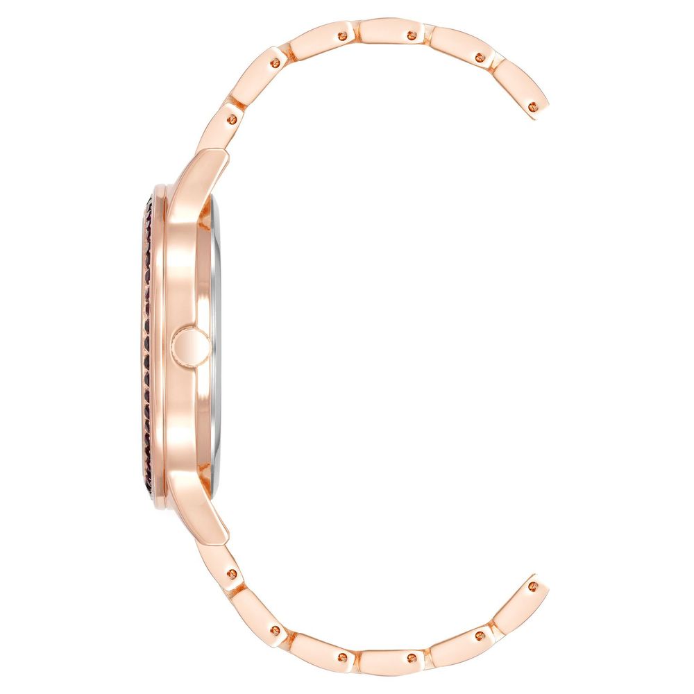 A rose gold watch with a multicolored face