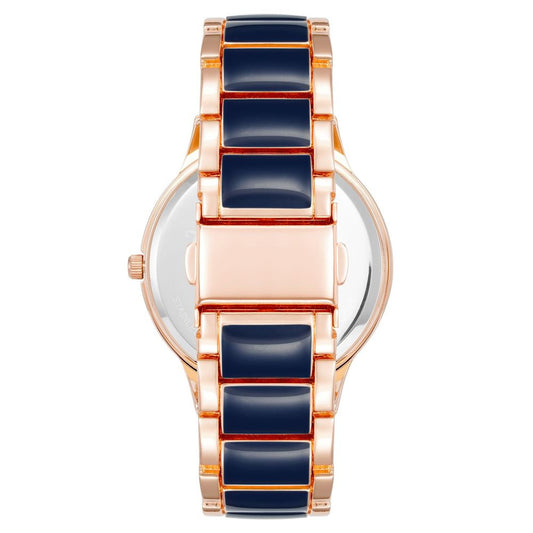 A multicolored watch with a rose gold band and blue face