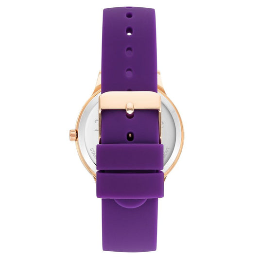 A purple watch with a white face and gold accents