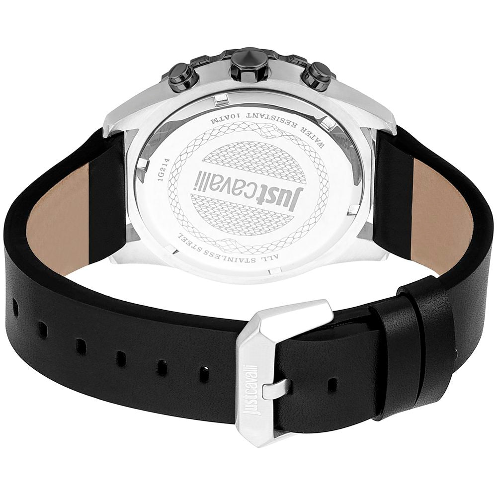 A black leather watch with a silver face and white logo on the dial
