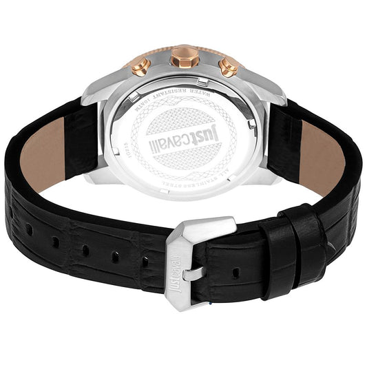 A black leather watch with a silver face and gold accents, featuring a logo on the dial