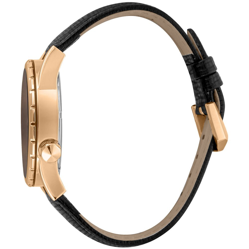 A black leather watch with a gold buckle and face, featuring a brown strap
