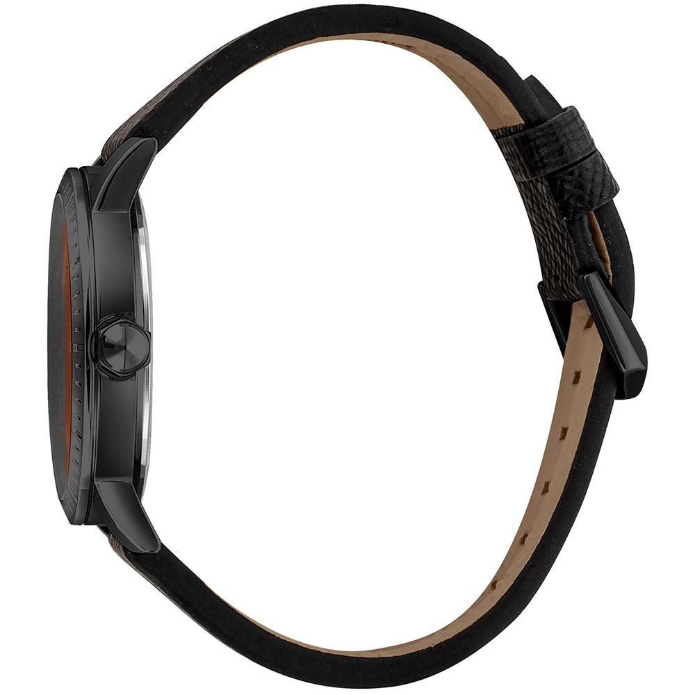 A black leather watch with a brown strap