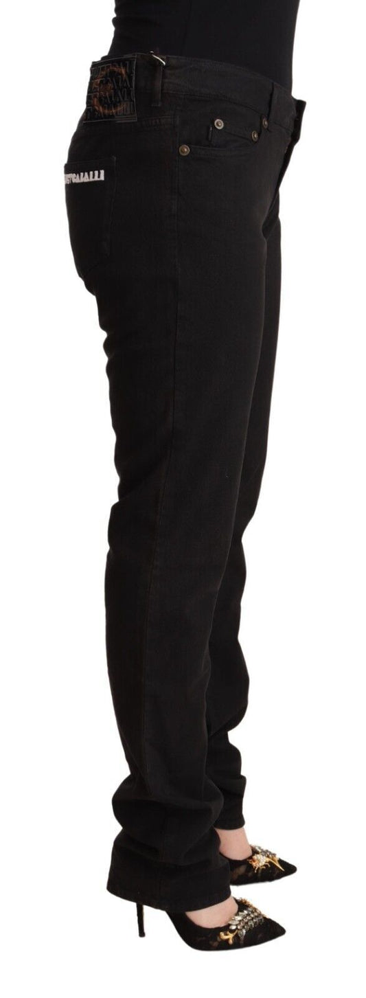 Woman wearing black pants and high heels